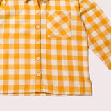 dettaglio lunghezza camicia a quadri gialla